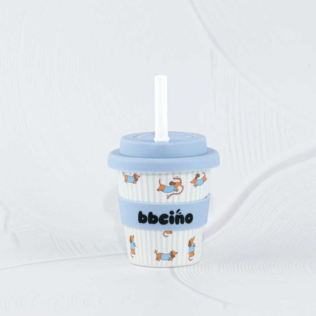 Children's cup with a straw on a white background