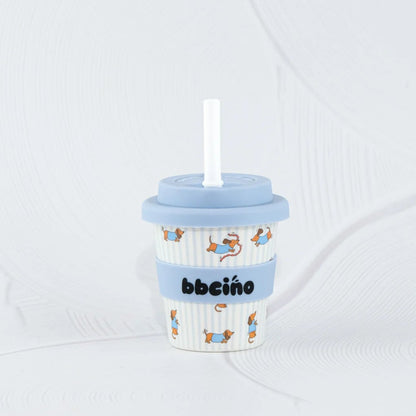 Children's cup with a straw on a white background