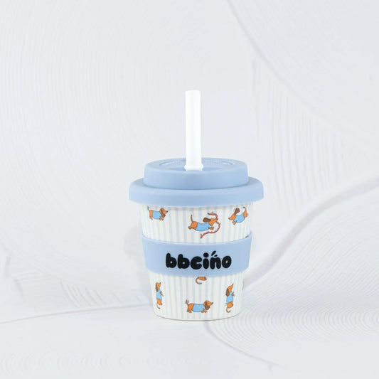 Children's cup with a straw on a white background