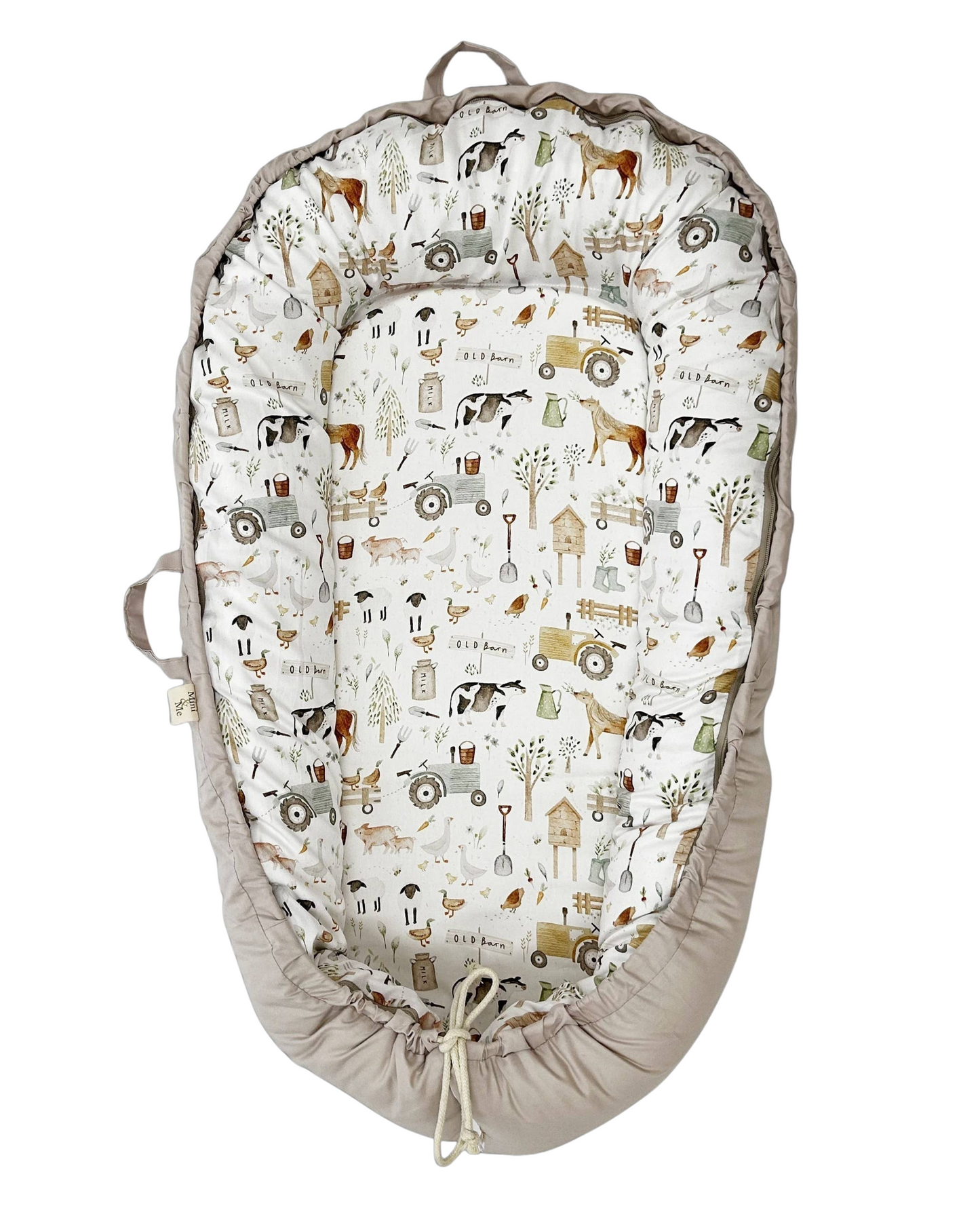 Baby nest with farm-themed pattern on a white background