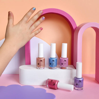 Nail polish bottles on a white platform with a hand reaching out, set against a pink and orange background.