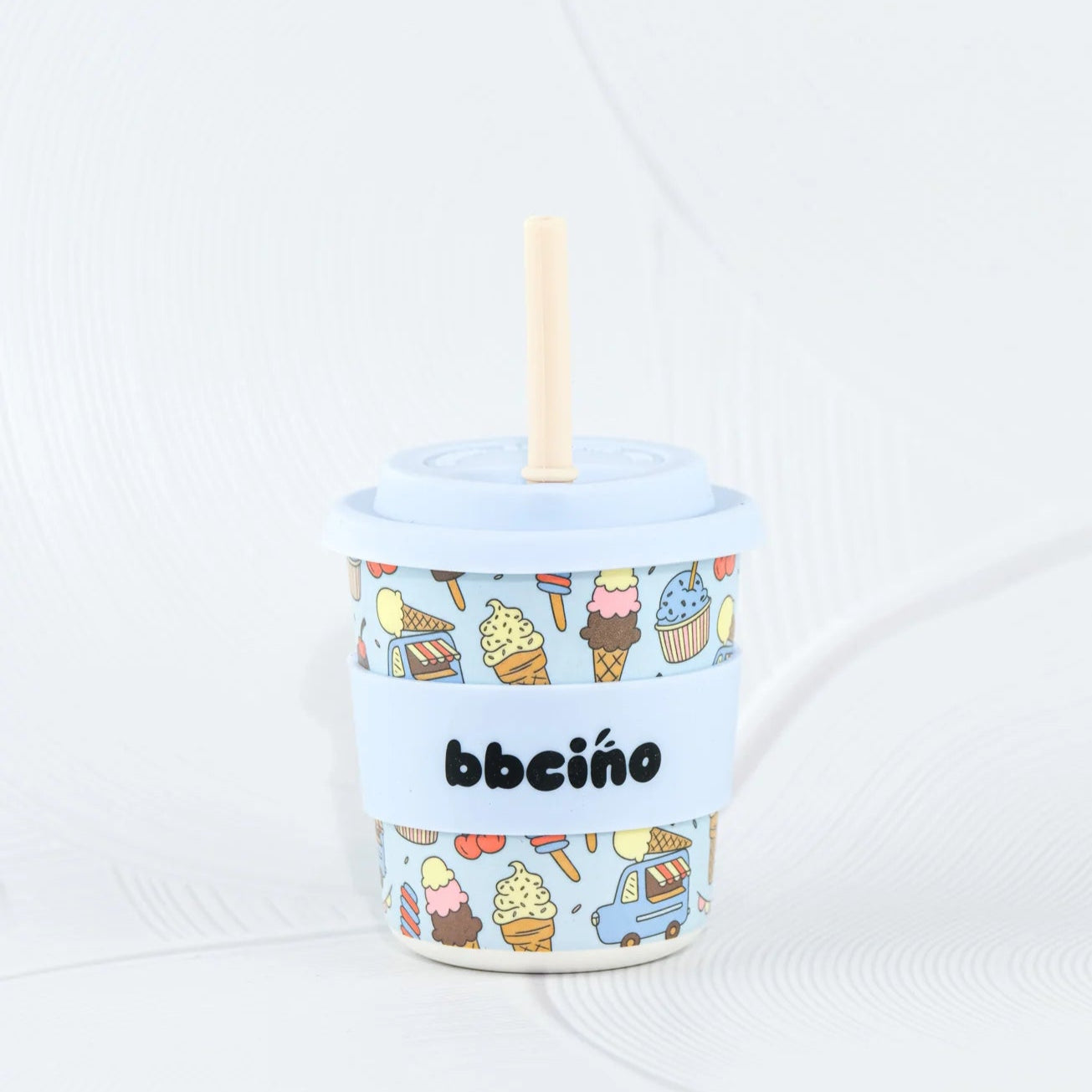 Tumbler with ice cream pattern and 'bbcino' branding on a white background