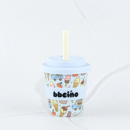 Ice cream-themed cup with a straw on a white background